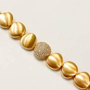 Pulseira Oval Cravejada com Mini Zircônia Semi Joia Dourada Fosca